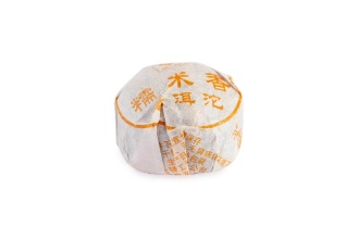 Прессованный шэн пуэр - Шэн пуэр «Номи сян сяото» маленькое гнездо с ароматом травы номи
