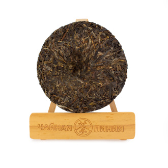 Pressed Raw Pu-erh Tea - Sheng pu'er from ancient trees in the village of Wangong in the Yiwu Mountains, brand "Tea Line", 200 g, 